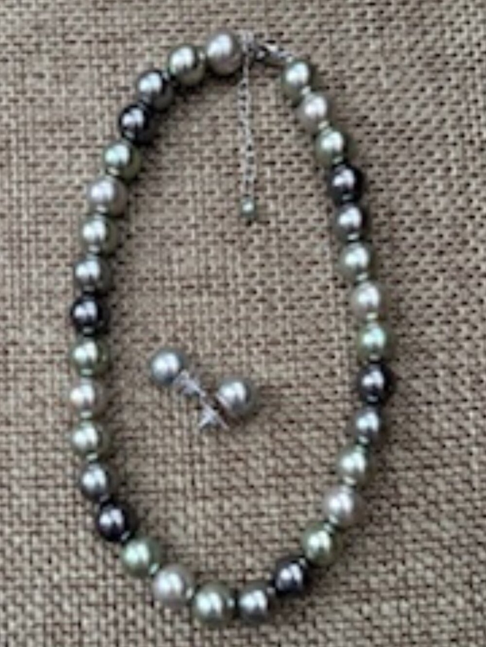 Avi Avi Designs necklace & earrings-Strand of shell pearls in shades of silver